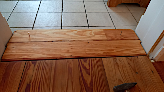 Einbau der Stufe vom Foyer zur Küche im OG